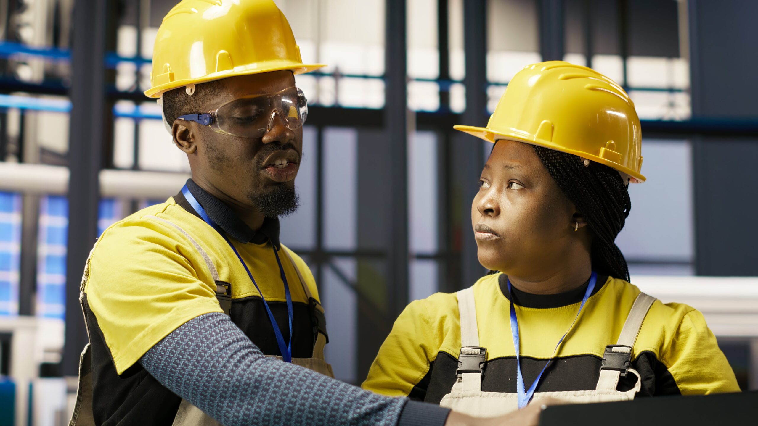 solar panels factory team working together fix gear min (1)